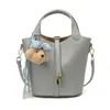 Bolso cubo moderno y elegante 2026 verano nuevo bolso de color liso para mujer bolso de hombro único bandolera bolso de mano versátil texturizado