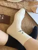 Otoño e invierno Nuevos calcetines de moda para mujer de punto grueso europeo con bordado de cara sonriente estilo ins japonés coreano a media pantorrilla calcetines de algodón clásicos
