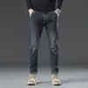 Jeans gruesos de alta gama para hombre de otoño e invierno, pantalones elásticos rectos de corte slim para hombre, pantalones versátiles de moda en oferta para hombre