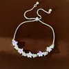 Pulsera colorida de estrella con incrustaciones de circonita, sensación de lujo ligero de nicho de alta gama, estilo fresco y dulce, joyería elegante para la mano al por mayor