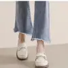 Mocasines de mujer de cuero suave estilo francés, nuevo modelo de otoño 2026, zapatos planos bajos sin cordones para ir al trabajo con suelas suaves