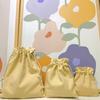 Bolsa de lona de color sólido con cordón, bolsa de almacenamiento con cordón simple, bolsa para el polvo para mujer, bolsa de almacenamiento con orejas lindas al por mayor