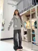 Sudadera con capucha gris de tres rayas retro no americana para mujer, primavera, otoño 2026, nueva, estudiante, suelta, cárdigan, ropa exterior