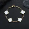 Pulsera Cruzada de Hip-Hop Europeo y Americano de Acero Inoxidable con Trébol de Cuatro Hojas para Mujer Cadena en Forma de O Joyería de Acero de Titanio Joyería de Diseño de Nicho Personalización de Joyería