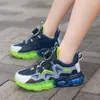 2026 Verão Meia-Idade Novo Botão Giratório Sapatos de Malha Estudante Leves Tênis de Corrida Sapatos Infantis Respiráveis Casuais