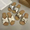 Sandálias rasteirinhas femininas para o verão de 2026, novas sandálias de praia slip-on versáteis e estilosas com tiras cruzadas