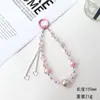 Popular Cordão de Cristal Trevo de Luxo Leve para Celular Corrente de Mão com Contas Artesanal Suporte para Celular de Pulso Capa de Celular Gancho para Bolsa