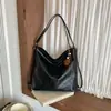 Bolso Retro de un Hombro Transfronterizo para Mujer 2026 Otoño Nuevo Simple Lujo Ligero Color Sólido Mochila Ajustable Bolso Cruzado para Viaje