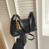 Bolsos de Gamuza de Nicho Más Vendidos en Otoño e Invierno 2025 Nuevo Bolso Cruzado Versátil para el Trabajo Bolso de Hombro para Mujer