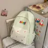 Nova Mochila Lisa Estilo Coreano, Mochila Escolar Casual e Leve para Alunos do Ensino Fundamental, Letras Bordadas de Alto Valor, Mochila para Alunos do Ensino Médio