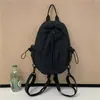 Design color-blocking 2026 nova mochila leve de nicho mochila casual simples para caminhada mochila escolar pequena multifuncional mochila