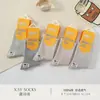 Série Xin Shiyu Outono e Inverno Novo Estilo Meia de Algodão Espessa All-In-One de Cano Médio, Meias Lisas de Ponto Duplo Perfumadas, Modernas e Versáteis