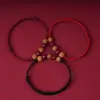 Pulsera de Hilo Rojo Tejida a Mano con Nube Auspiciosa de Madera de Durazno, Amuleto Unisex para el Año de su Zodíaco, Regalo Estilo Tendencia Nacional