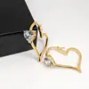 Moda europeia e americana alto senso linha oca senso linha amor zircônia brincos feminino temperamento personalidade brincos de duplo amor atacado