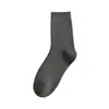 Meias femininas outono e inverno veludo acolchoado cano médio meias quentes cor sólida cano longo inverno toalha meias de chão Meias Terry