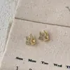 Pendientes Exquisitos de Nicho de Gama Alta Estilo Minimalista, Pequeños y Elegantes, Versátiles, Simples y a la Moda, Clips para Orejas/Aretes de Botón de Diamante Completo de Cuatro Hojas