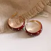 Pendientes de aro redondos con lunares y efecto de goteo de aceite estilo coreano ins, pendientes retro de alta gama de moda con un diseño único para mujer