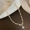 Collar de perlas naturales de agua dulce con forma de mariposa y circonitas para mujer, estilo nicho de alta gama, elegante y combinable con todo.