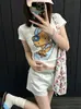 ¡Versión correcta!! La camiseta de manga corta con estampado de dibujos animados de hombre palo urbano es imprescindible para las fashionistas