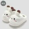 Pantufas de algodão fofas em formato de coelho para mulheres, adequadas para uso interno e externo no inverno, com solas grossas, forro quente e acolchoamento de fleece.. Atacado disponível