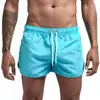 Nuevos pantalones de fitness de verano transfronterizos europeos y americanos para hombre, cómodos, transpirables, de color sólido, para correr, deportes de ocio y entrenamiento.