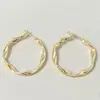 Pendientes de Aro Dorado 2025 Nuevos Trenzados Modernos Versátiles Elegantes Pendientes Súper de Hada para Mujer con un Toque de Lujo