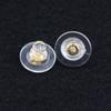 Tapa de aguja plateada transparente directa de fábrica hebilla de joyería de plata accesorios de aretes de goma suave tapón de goma G18K tapón de lámina de oro