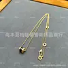 Collar de Cadena para Clavícula de Alto Nivel CNC Hombrecito Rojo Caridad Cintura Delgada para Mujer, Plata de Ley 925, Oro de 18K, Cerámica Blanca y Negra, Cadena Completa de Diamantes