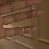Colar anel com símbolo do infinito em formato de 8, best-seller transfronteiriço, uma joia elegante e luxuosa com design único, perfeito para mulheres, e disponível para dropshipping