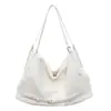 Bolso de mano de cuero suave relajado 2026 nuevo estilo para mujer simple de gran capacidad para el trabajo bajo el brazo bolso de hombro casual para mujer