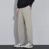 Pantalones casuales de seda cupro, nuevo estilo primavera y otoño 2026, pantalones de sastre rectos holgados, pantalones deportivos cónicos para hombre al por mayor