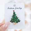 2026 Nuevo Broche Festivo Navideño Europeo y Americano Árbol de Navidad Broche de Papá Noel Botas Muñeco de Nieve Cascabel de Trineo Ramillete