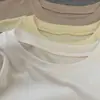 Estilo coreano! Camiseta minimalista e elegante de gola redonda e mangas compridas para o Outono/Inverno de 2026, fica bem usada sozinha ou em camadas, versátil