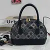 Bolso de concha de nicho estilo francés vintage para mujer, Nuevo de moda 2025 estilo Hong Kong material de retazos bolso de hombro y cruzado para mujer