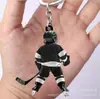 Accesorios Estilo Europeo y Americano Llavero Figura de Brazo Pequeños Regalos Accesorios de Llave de Cine y Televisión Modelos Periféricos Casco Rojo Blanco Naranja Blanco