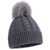Novos estilos de outono e inverno de gorros infantis de tricô trançado, disponíveis na Amazon para vendas transfronteiriças, em cores sólidas com pompons, proporcionando calor e proteção contra o vento