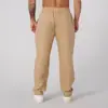 Pantalones Deportivos de Ocio para el Hogar de Estilo Europeo y Americano Transfronterizos para Hombre de Algodón Transpirable de Color Sólido Holgados Modernos de Algodón y Lino