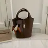 Bolsa bucket estilo cesta da moda para mulheres, nova coleção outono 2026, bolsa de ombro estilo coreano, cor sólida simples, bolsa transversal de nicho