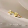 Pendientes de plata de ley s999 pendientes de moda nuevos patrón geométrico diamante cuadrado amarillo no alérgicos nicho joyería para orejas femenina de alta gama