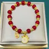Nuevo estilo Peiren lágrimas frijoles enamorados imitación hielo natural fondo transparente agua clara imitación jade Hetian pulsera pulsera estilo antiguo regalo de Año Nuevo