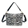Moda Europeia e Americana Estampa de Leopardo Material de Mergulho Bolsa de Cosméticos Design de Nicho Bolsa para Batom e Cosméticos Bolsa de Higiene Pessoal Portátil para Viagem