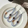 Ins Café con Leche Sal Marina Galleta Gatito Bloqueo de Color Azul y Marrón Lanyard para Teléfono Cadena de Muñeca DIY Colgante Llavero