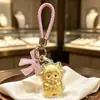 Colgante Año Nuevo de la Oveja, llavero de ovejita que destella dinero con lazo, colgante de bolsa de dibujos animados, regalo de buena fortuna para novia