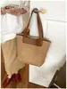Bolso Tote de un Hombro para Mujer Nuevo Primavera Verano Bolso de Paja Tejido a Mano Portátil Versátil Bolso de Playa Venta al por Mayor Transfronteriza Bolso de Mujer