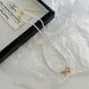 Collar de Perlas de Vidrio con Lazo de Perlas, Cadena para Clavícula de Lujo Ligero de Nicho de Gama Alta, Nueva Cadena de Cuello Popular 2026