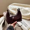 Bolso de Mujer 2025 Otoño Nuevo Estilo Bolso de Hombro Único Cruzado Textura Retro Nicho Francés Bolso de Axila Simple Elegante