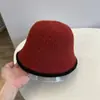 Sombrero Coreano al por Mayor Bloque de Color Tejido de Lana Sombrero Cubo Otoño e Invierno Cálido Cúpula Declaración Forma de Campana Sombrero de Pescador