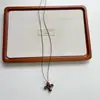 Nuevo collar colgante de símbolo de infinito de madera étnico estilo chino, cadena larga vintage para suéter con cuentas de piedra natural, accesorio de diseñador