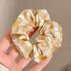 Goma de pelo suave y versátil para salir, scrunchie modelo nuevo 2026 estilo coreano, diadema de encaje femenina con sentido de atmósfera, venta al por mayor