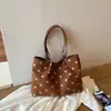 Bolsa feminina de camurça 2026 nova tendência outono vintage Maillard bolsa tote para o dia a dia bolsa de ombro de grande capacidade
